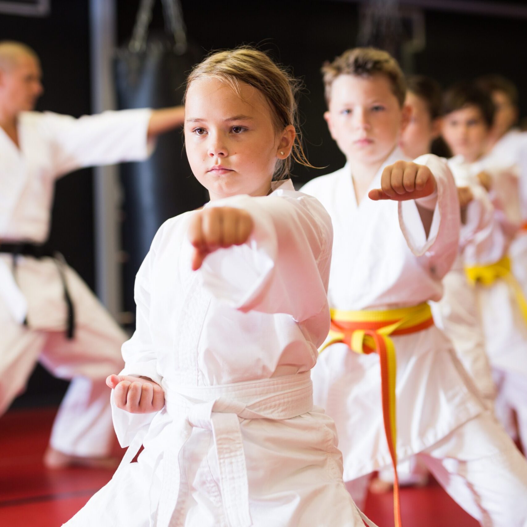 Karate,Kids,In,Kimono,Performing,Kata,Moves,With,Their,Teacher